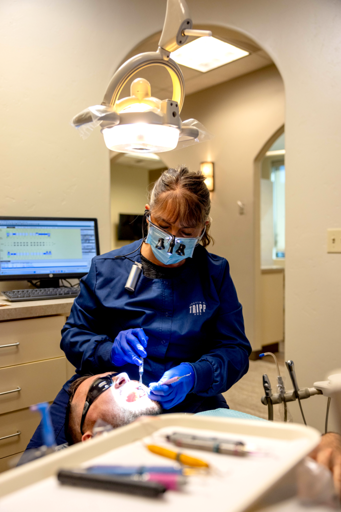 Dr. Tripp with a patient