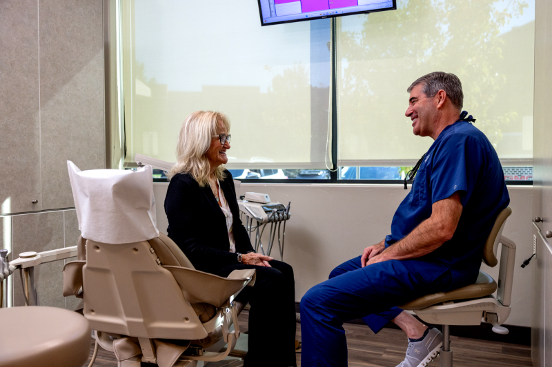Dr. Tripp with a patient