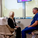Dr. Tripp with a patient